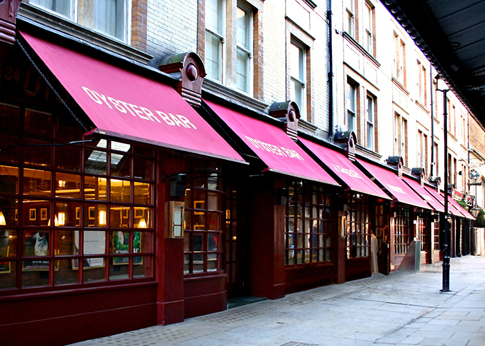 Why Restaurants Choose Red Awnings
