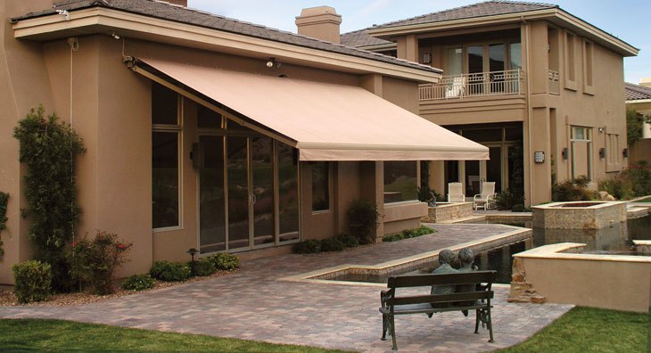Should You Install a Manual or Motorized Retractable Awning?