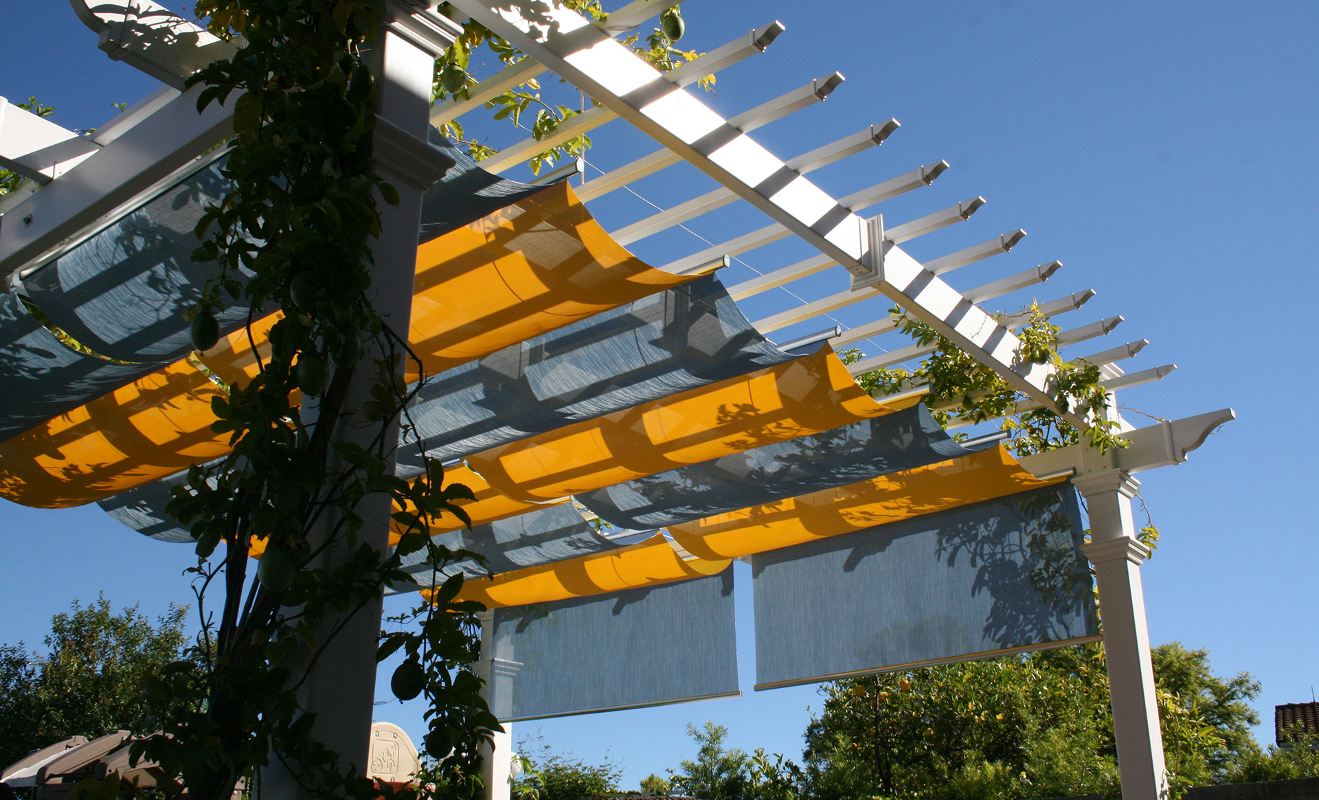 Pergola-Cover---Infinity-Canopy---yellow-and-blue-with-side-panels